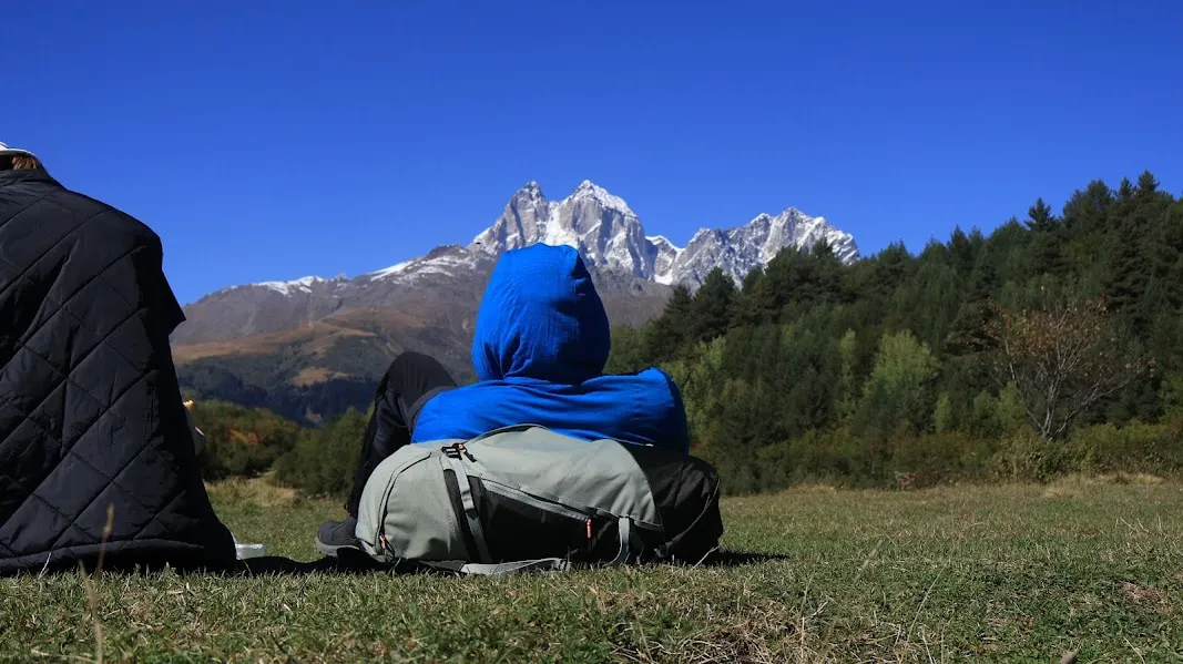 Hiker On The View Of Ushba Mestia-Ushguli trek – 4 days tour from Mestia