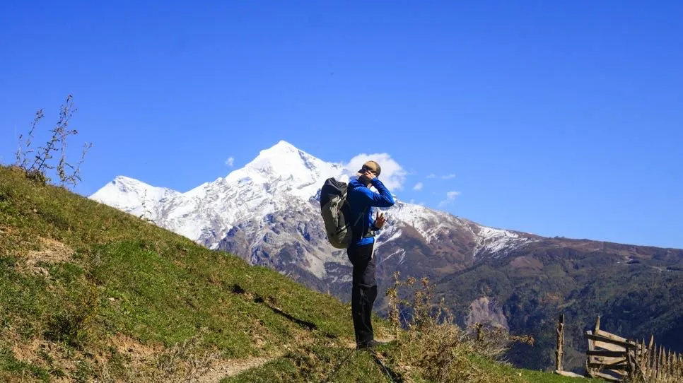 Hiker On The View Of Tetnuldi 1 Mestia-Ushguli trek – 5 days tour from Kutaisi